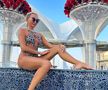 Crina Abrudan în costum de baie! Cum a apărut la o piscină de lux din Dubai