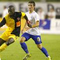 Vukusici, un tânăr de 19 ani la acea vreme, în duel cu Ousmane N'Doye, una dintre vedetele câinilor