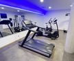 Zona de fitness de la hotelul Melchior Park Würzburg