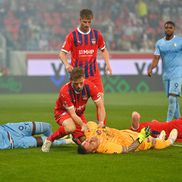 Portarul lui Heindenheim, Kevin Muller, inconștient după ciocnirea cu Ibrahima Sissoko în meciul cu Bochum / Foto: Imago