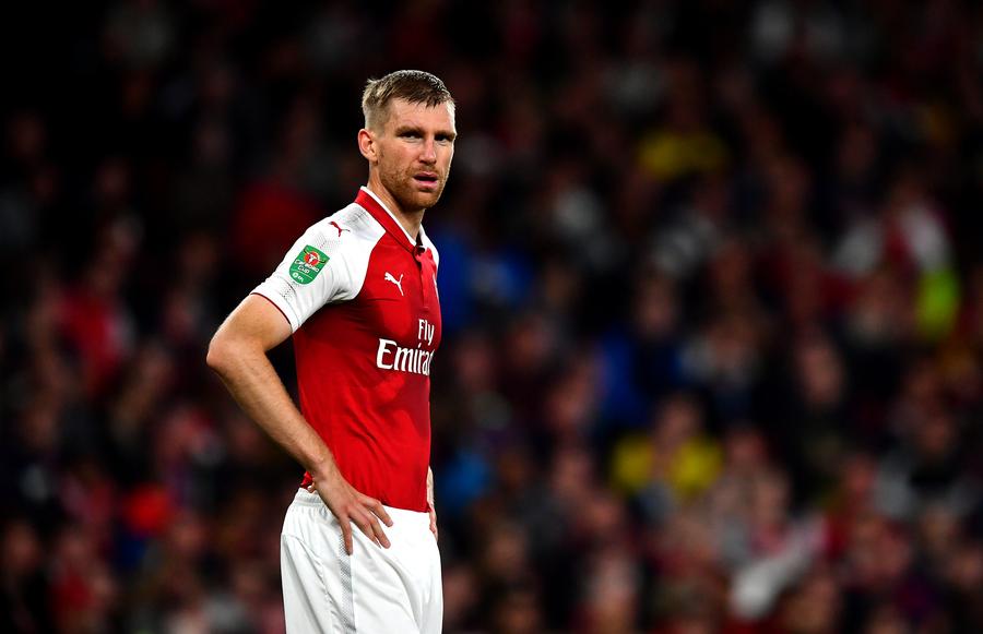 Per Mertesacker, în tricoul lui Arsenal // FOTO Getty Images Campion mondial cu Germania, gata să preia naționala: „Sunt disponibil”