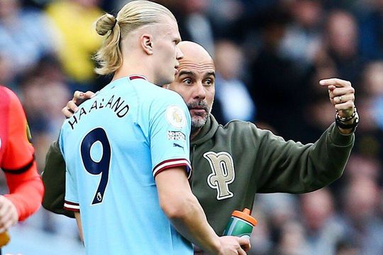Pep Guardiola și Erling Haaland