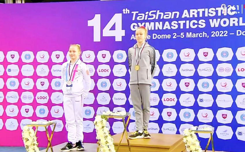 Gimnasta ucraineană Daniela Batrona (15 ani) a refuzat să urce pe podium alături de rusoaicele Victoria Listunova (16 ani) și Maria Minaeva (16 ani), la etapa de Cupă Mondială de la Doha.