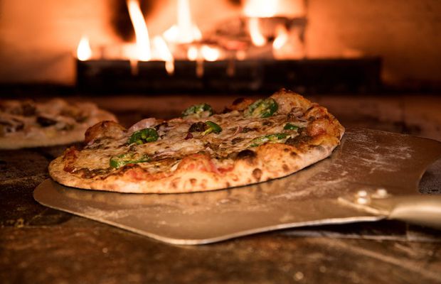 Povestea Domino’s: De la o mica pizzerie la un fenomen global