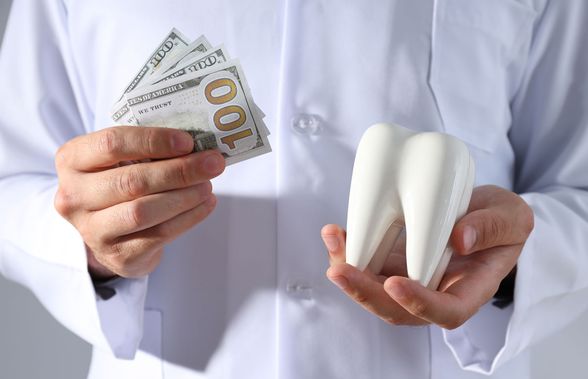 Cum se calculează prețul intervenției de implant dentar?