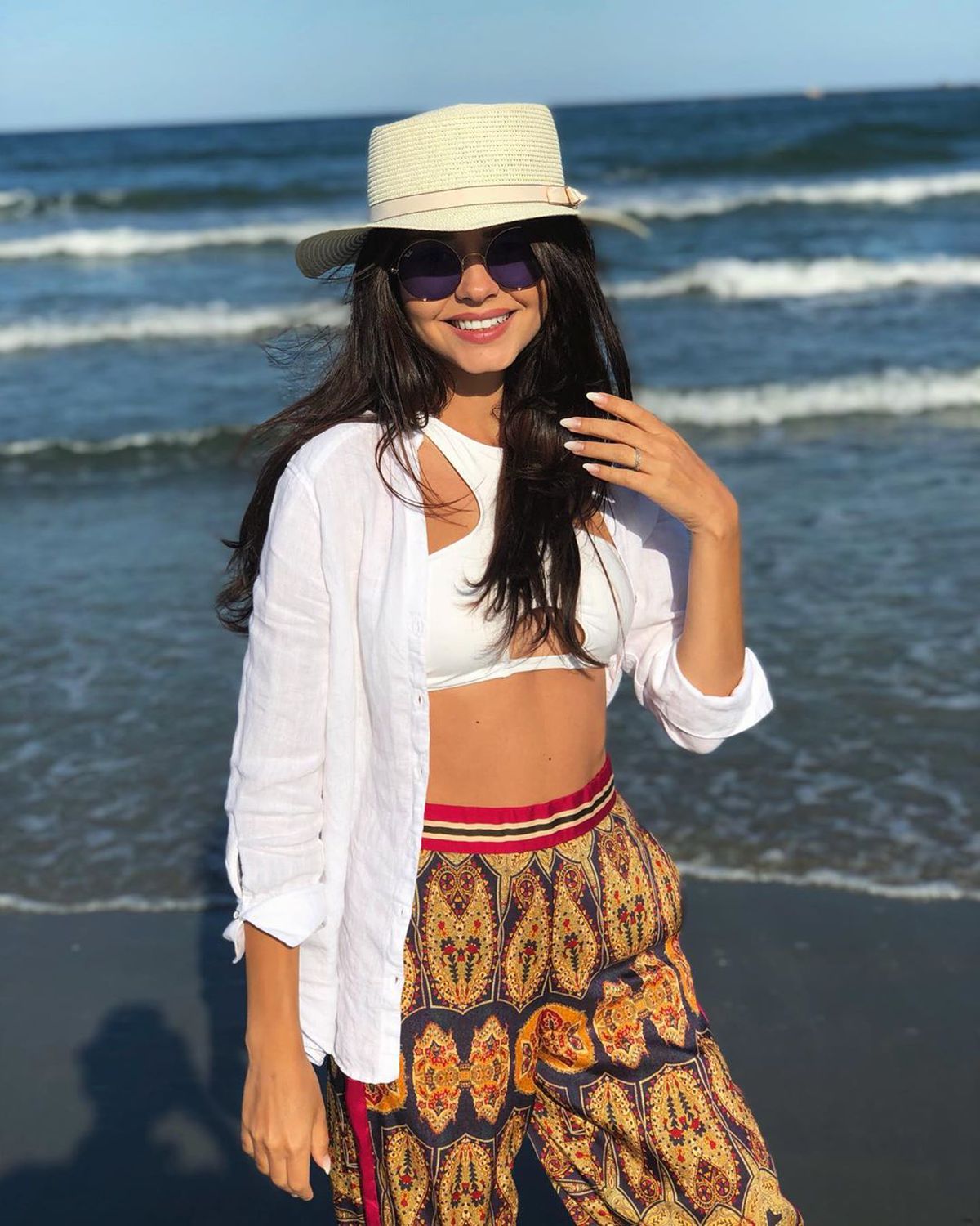 FOTO Viitorul joacă tare » Iubita lui Carlo Casap pozează HOT la malul mării