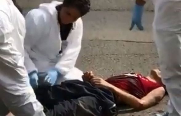 ATENȚIE IMAGINI VIOLENTE » Trei fani din Columbia au ucis un suporter rival în plină stradă! Unul dintre atacatori era minor