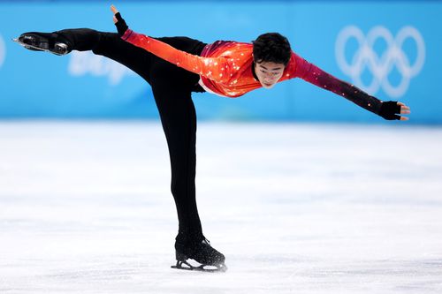 Nathan Chen într-o piruetă pe gheața de la Beijing FOTO Guliver/GettyImages