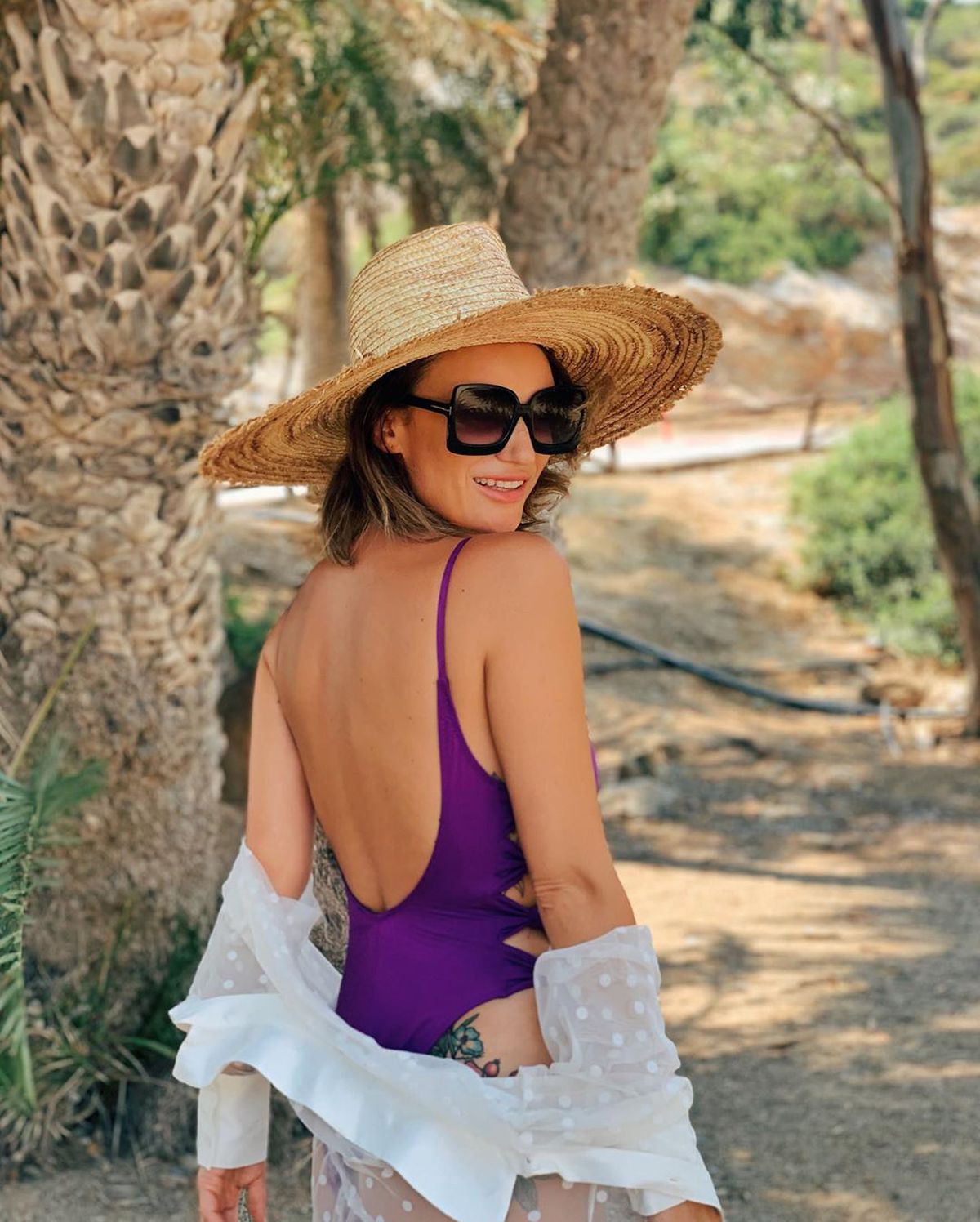 GALERIE FOTO Carmen Negoiță, în costum de baie la munte! Apariție hot a soției fostului finanțator de la Dinamo