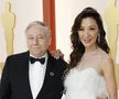 Fostul mare boss de la Ferrari, Jean Todt, alături de premiata serii, Michelle Yeoh