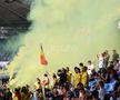Fumigene aprinse de ultrașii de la Uniți sub tricolor la meciul Spania - România, de la Euro U21. Foto: Ionuț Iordache (GSP.RO)