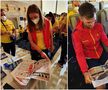 Membrii echipei olimpice, citind ediția de astăzi a ziarului Gazeta Sporturilor