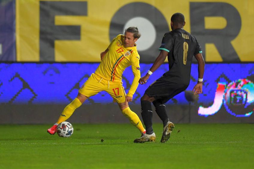 Ciprian Deac, într-un duel cu David Alaba în România - Austria 0-1