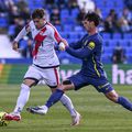 Andrei Rațiu (echipament alb), în Rayo - Atletico 3-0 / Foto: Imago