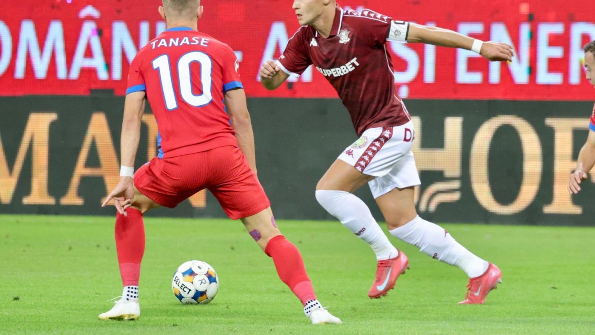 Jucători FCSB și Rapid în duel tensionat pe teren în timpul sfertului UEFA, ilustrând rivalitatea FCSB Rapid și cazul Bricheta. | sursa foto: Gazeta Sporturilor