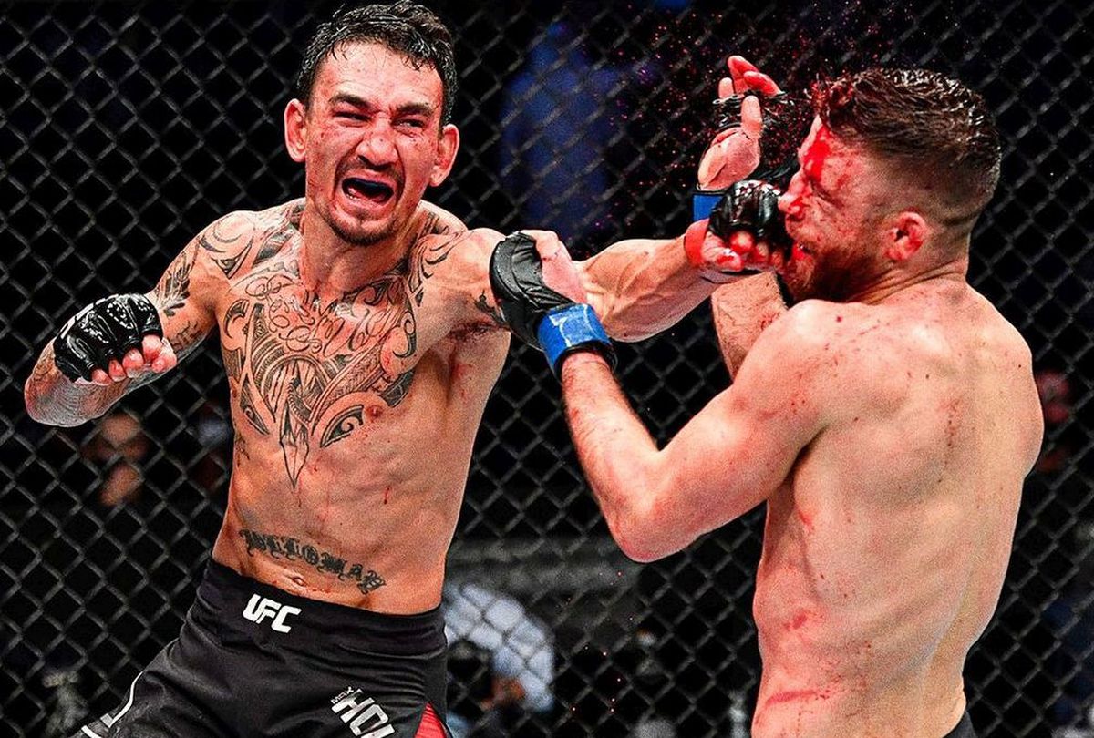 VIDEO + FOTO Luptă istorică în UFC! Max Holloway și-a umplut de sânge adversarul: 141 de lovituri într-o singură rundă! Cum l-a umilit în final