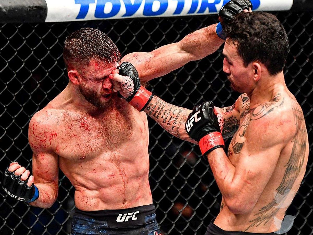 VIDEO + FOTO Luptă istorică în UFC! Max Holloway și-a umplut de sânge adversarul: 141 de lovituri într-o singură rundă! Cum l-a umilit în final