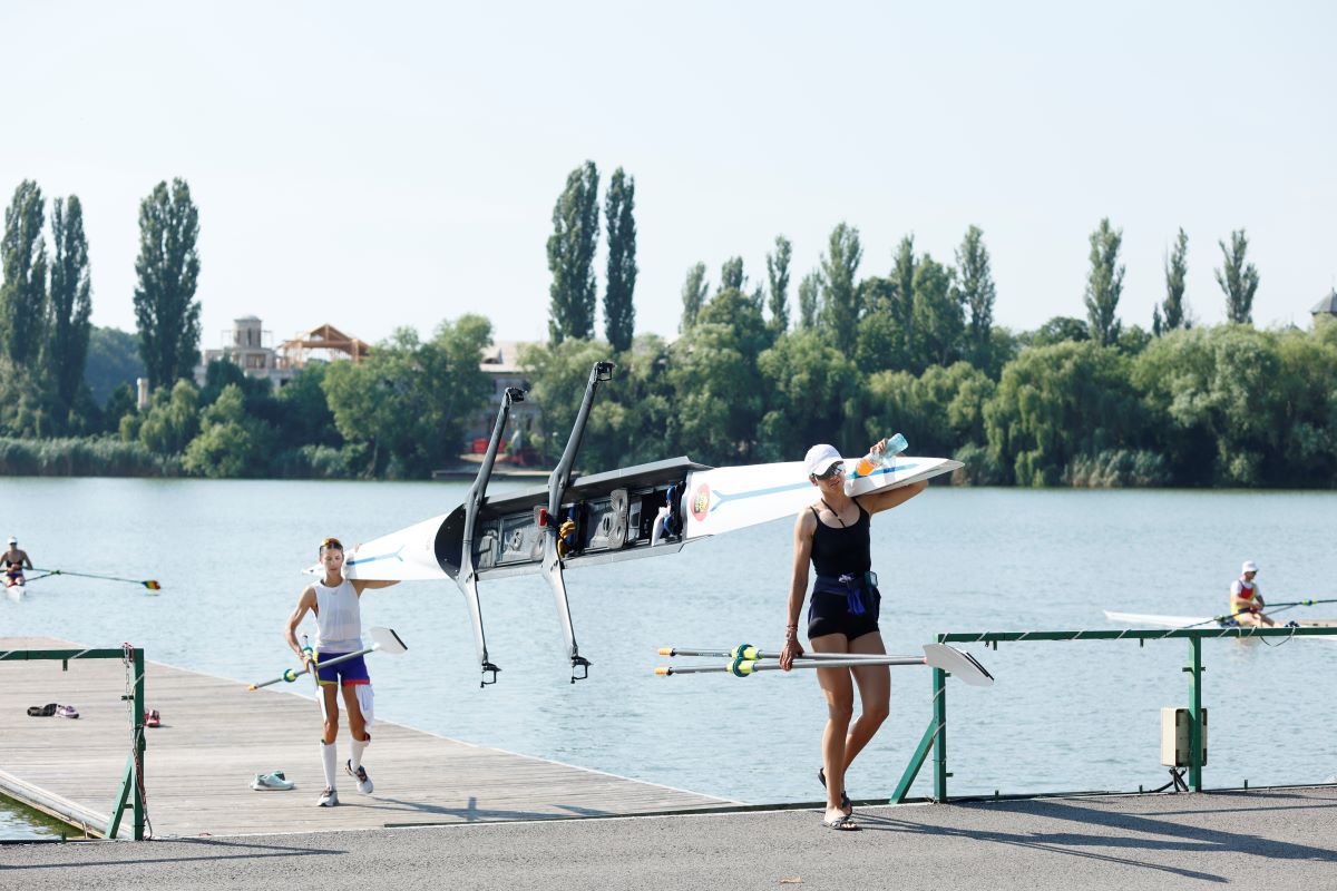 Așa arată pregătirea pentru Jocurile Olimpice » Imagini spectaculoase pe lacul Snagov: reporterii GSP, lângă bărcile care vâslesc către aur + omul invocat de toți sportivii