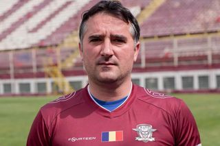 Nae Stanciu, legenda Rapidului, încătușat de polițiști pe bulevardul Dimitrie Pompeiu din București