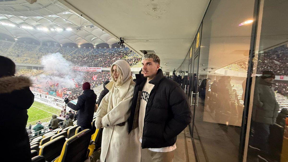 Apariție-surpriză! Internaționalul român și-a luat iubita și a venit prin ger la Rapid - Dinamo