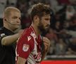 AUCH! Ciocnire horror în U Cluj - Dinamo: fotbalistul lui Uhrin, schimbat după ce a fost făcut K.O. de Ely Fernandes!