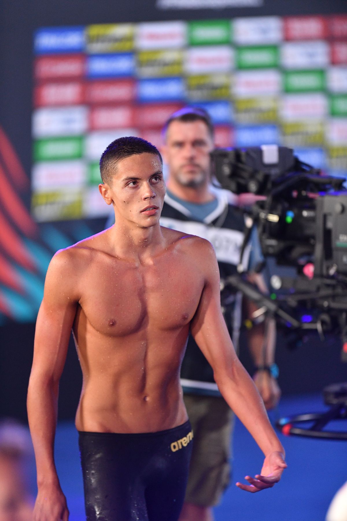 Situație incredibilă înaintea finalei lui Popovici » Doi sportivi, obligați să revină în bazin la două ore după semifinale