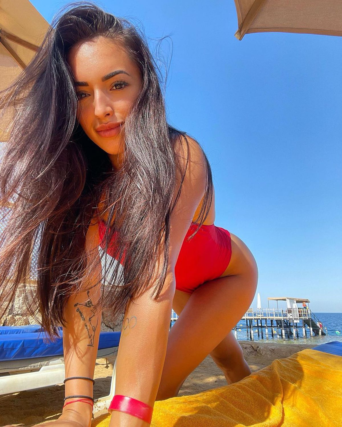 FOTO Larisa Iordache a avut o vară fierbinte! Sexy-gimnasta, mai hot ca niciodată pe plajă