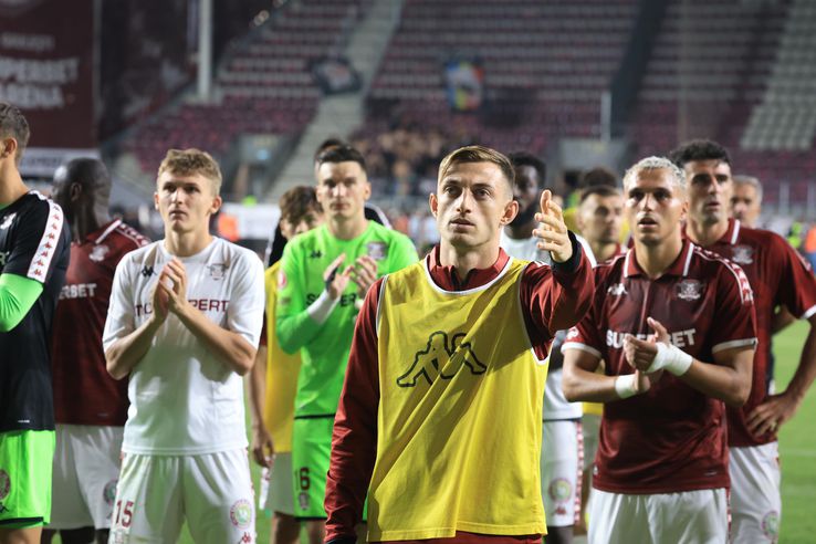 Micovschi și Marian Aioani, jucătorul celor de la Rapid, foto: Ionuț Iordache / GSP