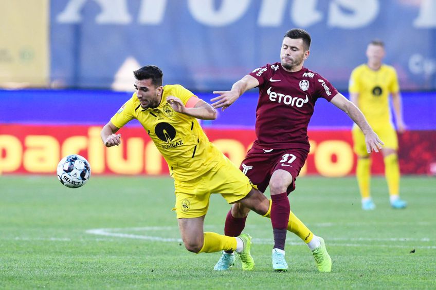 Ronaldo Deaconu (în galben), în duel cu Mihai Bordeianu // foto: Guliver/gettyimages