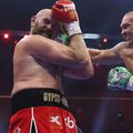 Tyson Fury, încasând o lovitură de la Usyk/ foto Guliver/GettyImages