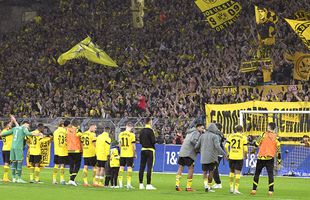 Suporterii Borussiei Dortmund au sărbătorit victoria cu Frankfurt ca pe titlu! În ploaie, cu copiii
