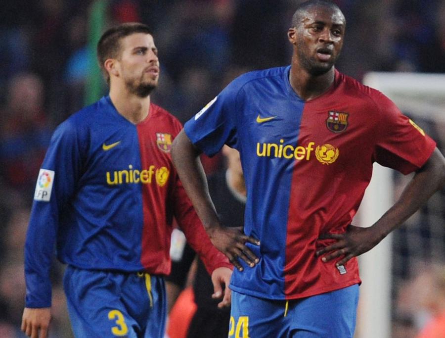 Gerard Pique și Yaya Toure (foto: Guliver/Getty Images) Yaya Toure și-a găsit echipă! Fostul star de la Manchester City a semnat primul contract ca antrenor principal