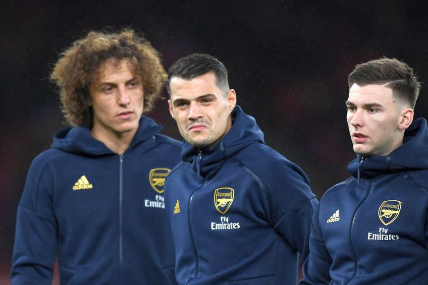 Granit Xhaka (centru) și David Luiz (stânga) sunt printre jucătorii lui Arsenal care nu au respectat măsura carantinării // sursă foto: Guliver/gettyimages