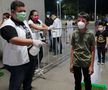 GALERIE FOTO Box în vremea pandemiei » Pugiliști stropiți cu dezinfectant înaintea luptelor și spectatori distanțați