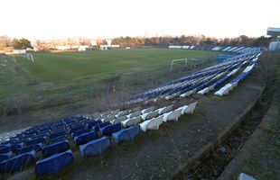 Fără fotbal, dar cu stadion! Imagine rară într-un oraș din România: bloc de locuințe în incinta arenei