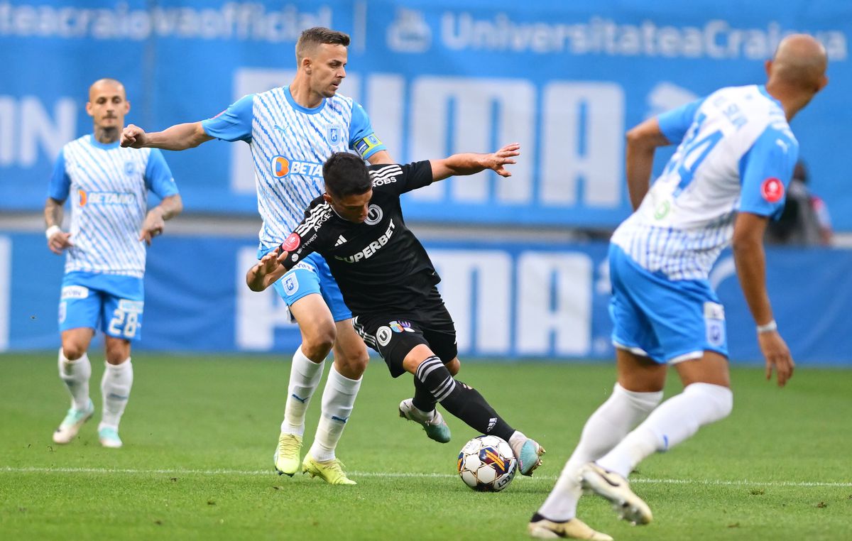 Ce nu s-a văzut la TV la meciul U Craiova - U Cluj » Un spectator a aruncat cu un obiect spre arbitrul Marcel Bîrsan, ce riscă oltenii