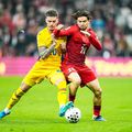 Ferdi Kadioglu, în duel cu Dennis Man // foto: Imago Images