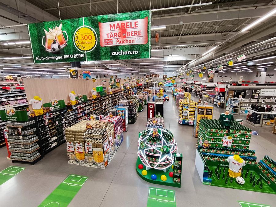 Meciul celor mai bune beri are loc la Marele Târg de Bere și Fotbal Auchan 2024: Startul partidei la cumpărături începe cu peste 300 de sortimente pentru toate gusturile