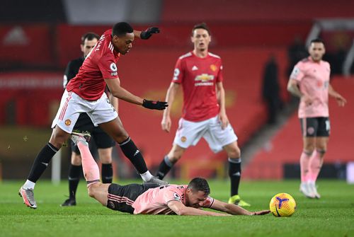 Martial și Tuanzebe, jucătorii lui Manchester United, au fost abuzați pe rețelele de socializare de fanii propriei echipe, după înfrângerea cu Sheffield United, 1-2, care a dus la pierderea locul 1 în Premier League. Guliver/GettyImages