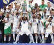 Imagini FABULOASE cu bucuria jucătorilor lui Real Madrid: Kroos și Modric s-au tăvălit pe gazon, Marcelo a vrut să fugă cu trofeul