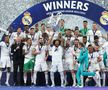 Imagini FABULOASE cu bucuria jucătorilor lui Real Madrid: Kroos și Modric s-au tăvălit pe gazon, Marcelo a vrut să fugă cu trofeul