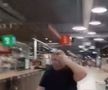 FOTO Incident grav la un hypermarket din București: un agent de pază a scuipat un client, după ce acesta i-a atras atenția că nu poartă mască