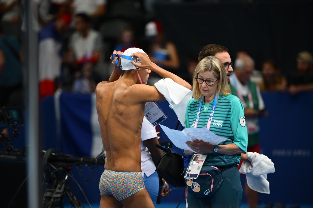 David Popovici, încălzire sub ochii lui Michael Phelps