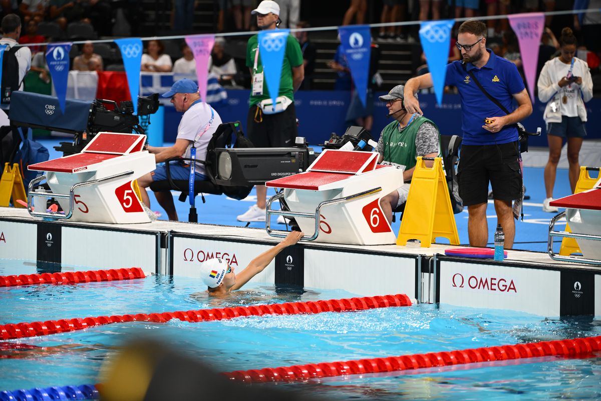 David Popovici, încălzire sub ochii lui Michael Phelps