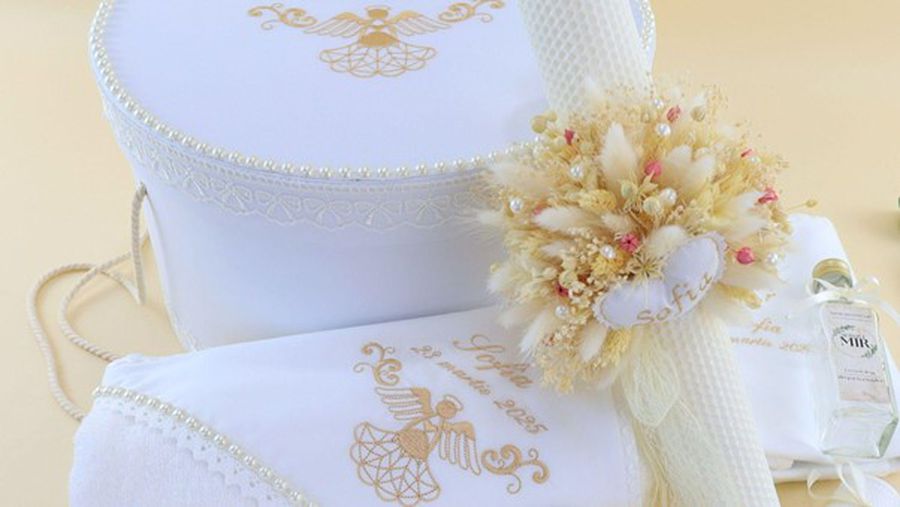 Simbolistica trusoului de botez explicată de Atelierele Cris