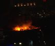 Un incendiu puternic a izbucnit în această seară pe Calea Giulești din București. De vină au fost 12 vagoane de tren dezafectate. Pompierii încă luptă pentru stingerea focului.