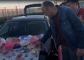 Imagini fabuloase cu Dan Șucu! Fanii au întins masa pe o mașină, la o benzinărie, patronul a mâncat parizer alături de ei