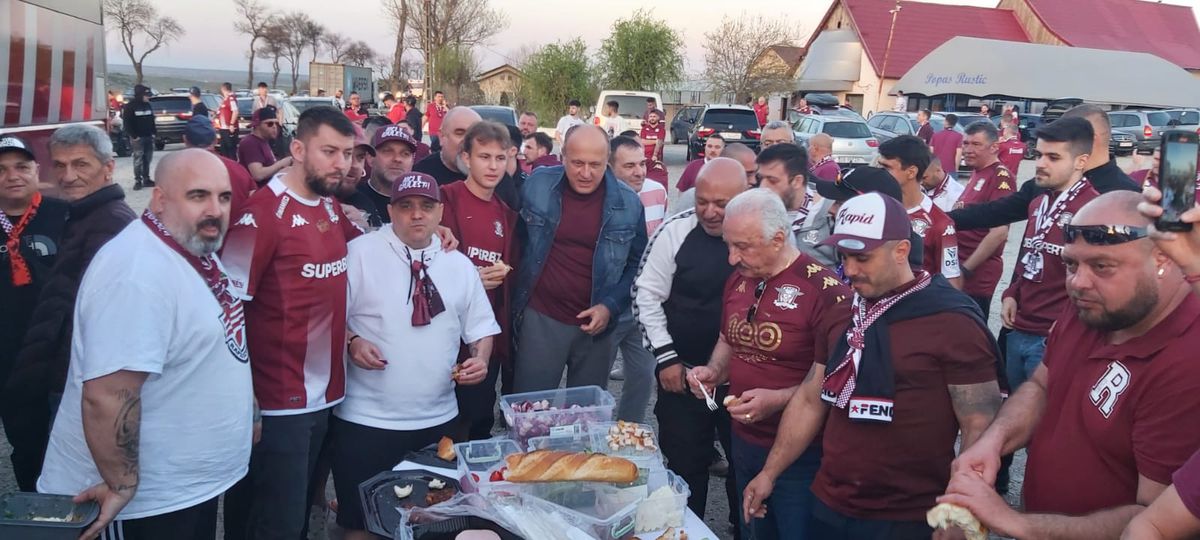 Imagini fabuloase cu Dan Șucu! Fanii au întins masa pe o mașină, la o benzinărie, patronul a mâncat parizer alături de ei