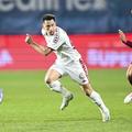 Marian Huja (dreapta), în duel cu Olimpiu Moruțan în CFR Cluj - Rapid / Foto: Imago Images
