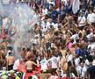 PSG-Arsenal. Ultrașii lui PSG s-au dezbrăcat la pielea goală pe Puskás Aréna. Foto: Ionuț Iordache (GSP.RO)